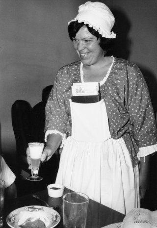 Kathy Bohince delivers syllabub at the Shields Tavern